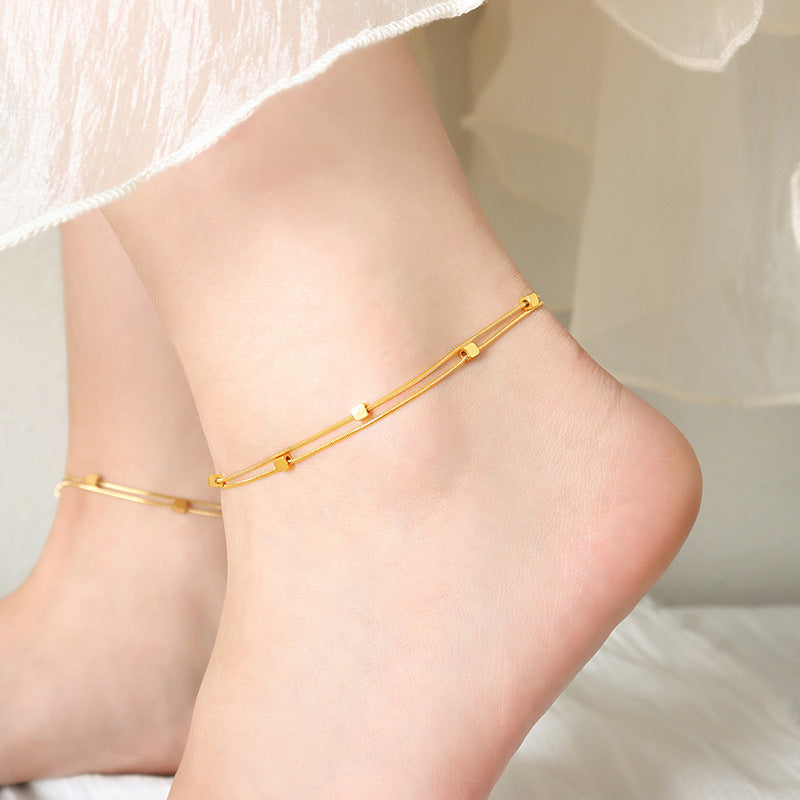 Exquisite and noble 18K gold squares paired with double-layered beach-style anklets