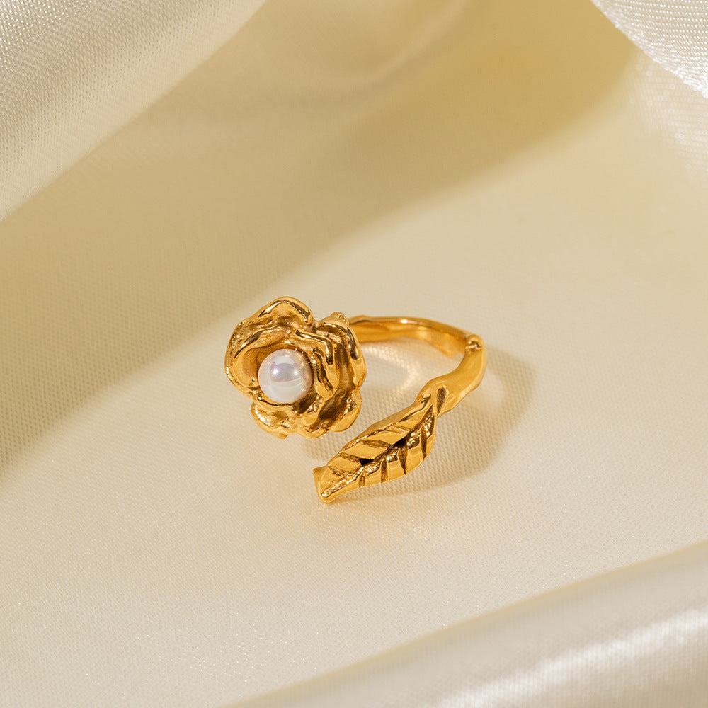 Exquisite and noble camellia inlaid pearl design ring in 18K gold